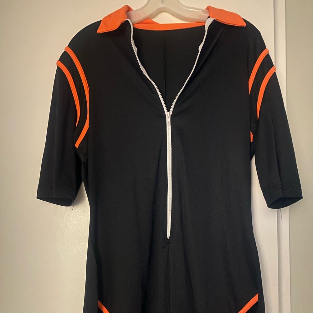 Orange and black catsuit with collar and 3/4 sleeves